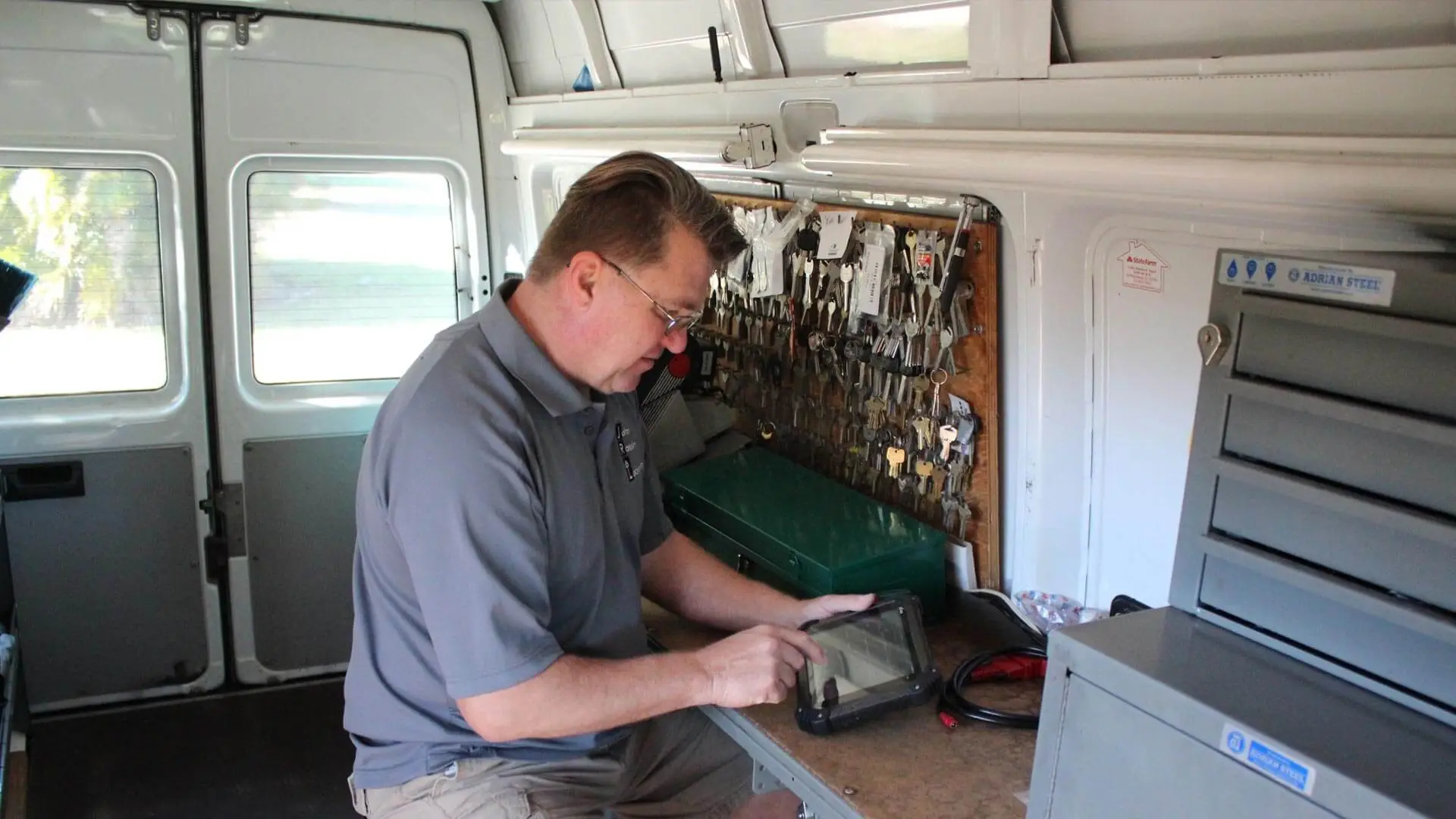 Local St. Petersburg, FL locksmith, John Rossin working in his mobile locksmith van.